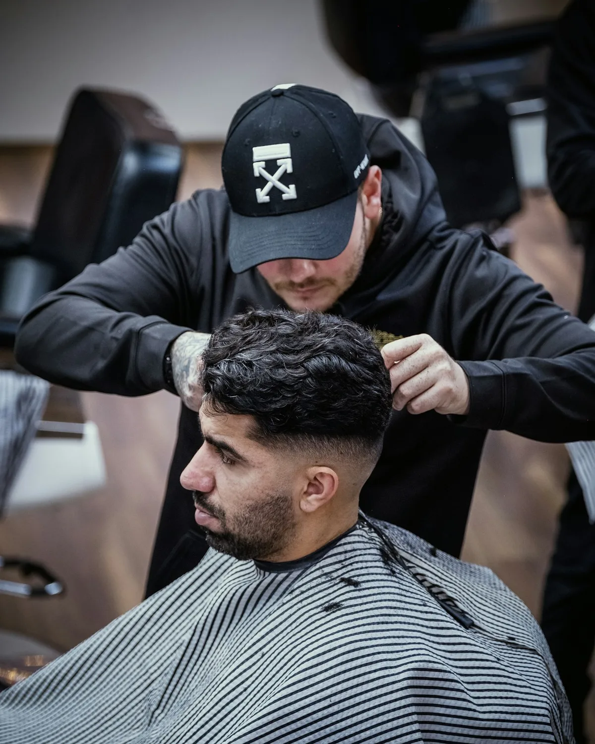 A barber at work in a local shop